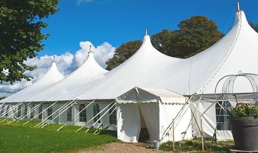 a line of sleek and modern portable toilets ready for use at an upscale corporate event in Golden